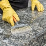 Cleaning- Hand brushing granite marker