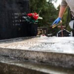 Cleaning- rinsing headstone